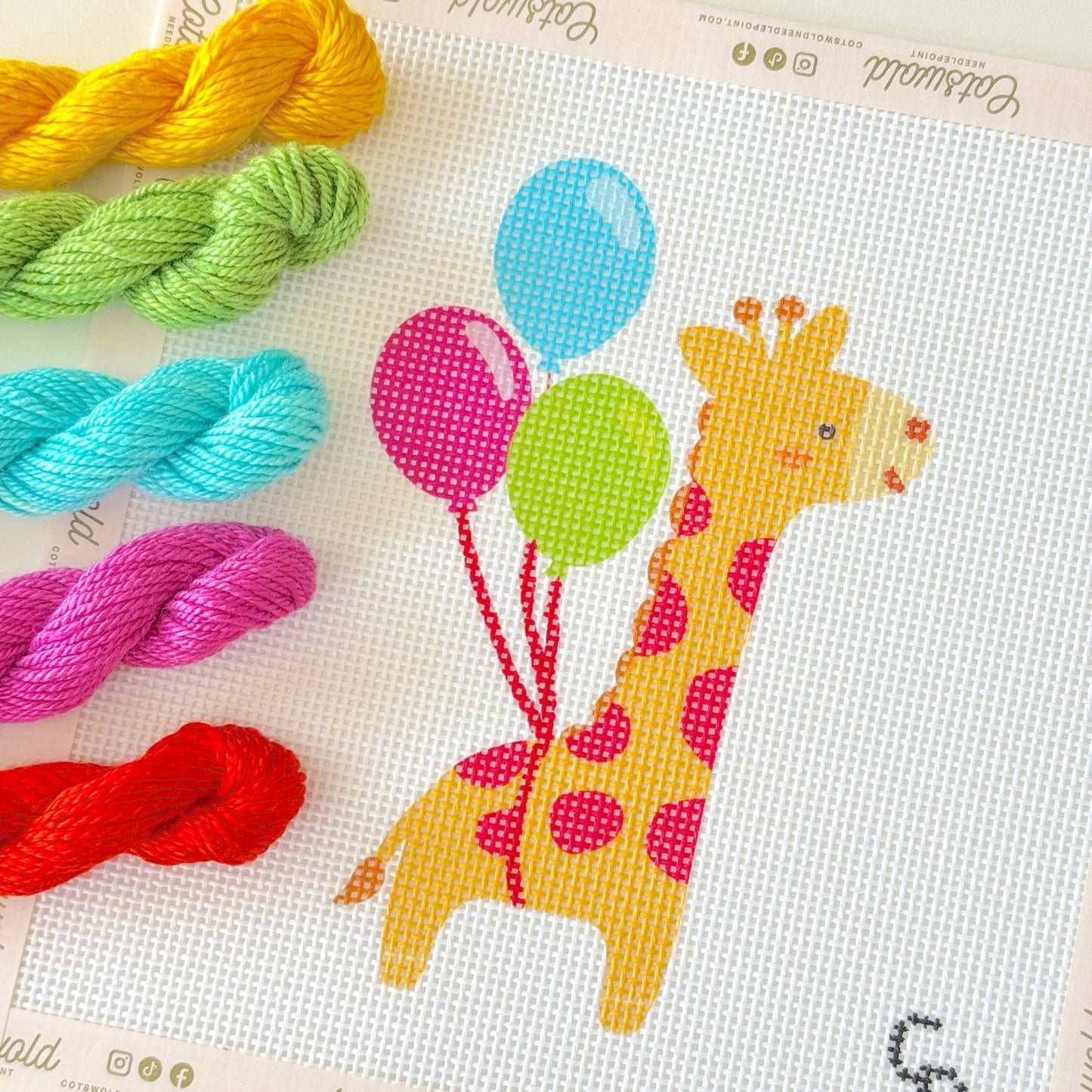 Detailed close-up of colorful giraffe with balloons 13 mesh needlepoint canvas