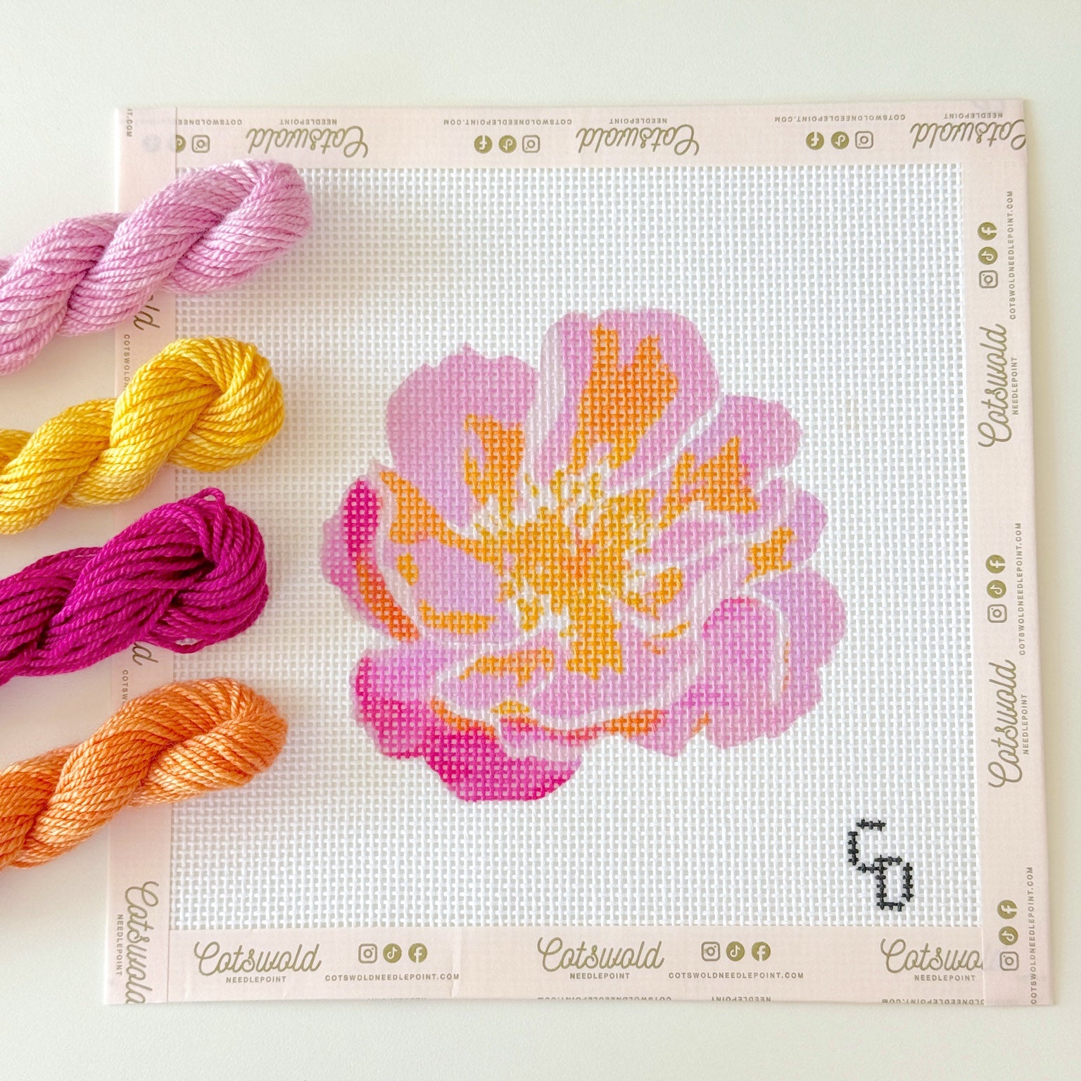Pink and orange flower hand-painted 13 mesh needlepoint canvas with coordinating fibers
